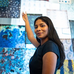 Girl pointing to fabrics